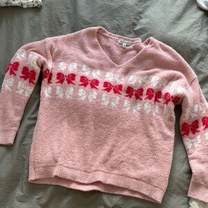 Pink V-Neck Sweater with Red Decorative Band